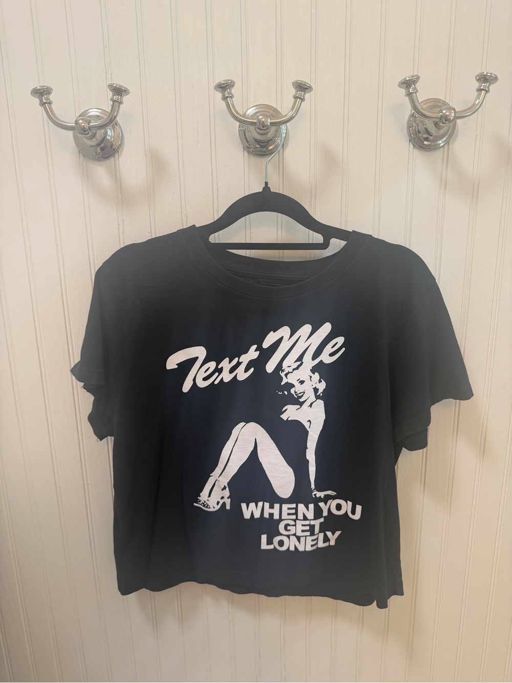 LONELY GHOST Black Crop Tee with White Pin-Up Graphic